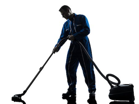 plomero - one caucasian janitor vaccum cleaner cleaning silhouette in studio on white background Foto de stock - Super Valor sin royalties y Suscripción, Código: 400-06953925