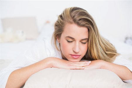 simsearch:693-07542343,k - Gorgeous model relaxing on her bed in bright bedroom Stock Photo - Budget Royalty-Free & Subscription, Code: 400-06960001