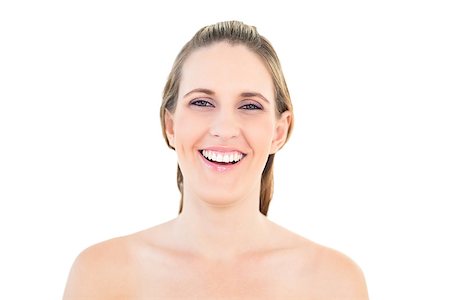 simsearch:400-06960125,k - Portrait of smiling woman against white background Photographie de stock - Aubaine LD & Abonnement, Code: 400-06960041