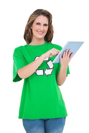 Happy environmental activist using tablet looking at camera against white background Foto de stock - Super Valor sin royalties y Suscripción, Código: 400-06960180