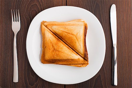 simsearch:400-07036577,k - Delicious grilled sandwich on a white plate Stock Photo - Budget Royalty-Free & Subscription, Code: 400-07036576