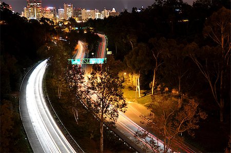 slow shutter - Light trails on the 163 freeway in San Diego with city skyline in the background Photographie de stock - Aubaine LD & Abonnement, Code: 400-07037357