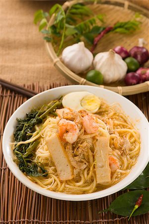 steam asian soup - Prawn mee, prawn noodles. Famous Malaysian food spicy fresh cooked har mee in clay pot with hot steam. Stock Photo - Budget Royalty-Free & Subscription, Code: 400-07038483