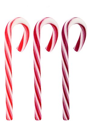 Three Candy Canes On White Background Stock Photo - Budget Royalty-Free & Subscription, Code: 400-07038621