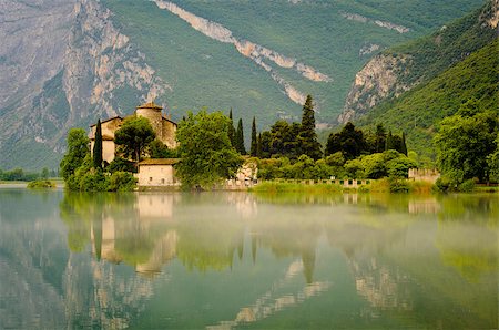 simsearch:400-06134092,k - The Medieval Castle Toblino reflecting in the calm waters of Toblino Lake. Trentino, Italy Foto de stock - Super Valor sin royalties y Suscripción, Código: 400-07038698