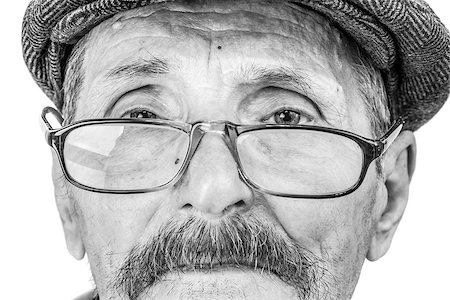 simsearch:400-05887166,k - the face of an old man wearing glasses and a cap Foto de stock - Super Valor sin royalties y Suscripción, Código: 400-07039017