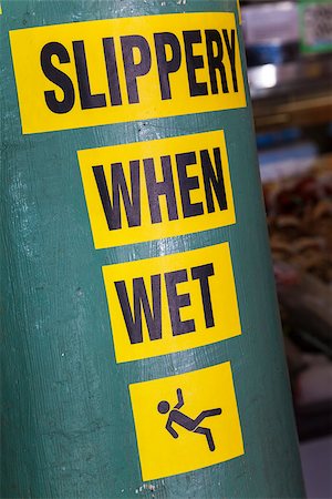 dangerous when wet sign - Slippery When Wet sign Stock Photo - Budget Royalty-Free & Subscription, Code: 400-07039301