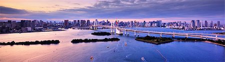 rainbow bridge tokyo - Rainbow Bridge spanning Tokyo Bay with Tokyo Tower visible in the background. Stock Photo - Budget Royalty-Free & Subscription, Code: 400-07039326