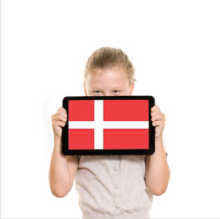 danish ethnicity (female) - flag of denmark on tablet computer held by young girl Stock Photo - Budget Royalty-Free & Subscription, Code: 400-07039342