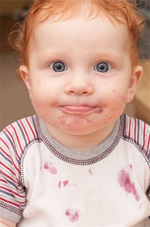 Portrait of Funny Baby With Dirty Face After Eating Stock Photo - Budget Royalty-Free & Subscription, Code: 400-07039669