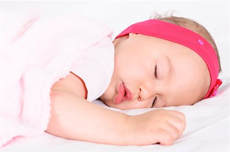 Little baby girl sleeping. Selective focus on the baby head Stockbilder - Microstock & Abonnement, Bildnummer: 400-07039968