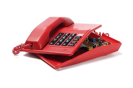 simsearch:400-07038627,k - Red Telephone Exposing Internal Components On White Background Photographie de stock - Aubaine LD & Abonnement, Code: 400-07044324