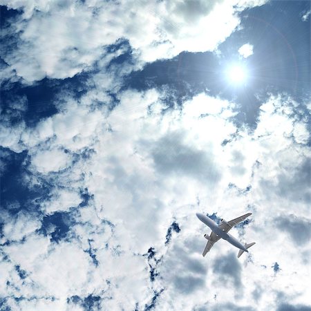 simsearch:400-04378611,k - an airplane flying above blue sky, place for your content Stock Photo - Budget Royalty-Free & Subscription, Code: 400-07044389