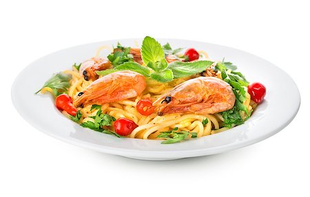eating seafood restaurant - Spaghetti with prawns isolated on a white background Photographie de stock - Aubaine LD & Abonnement, Code: 400-07044769