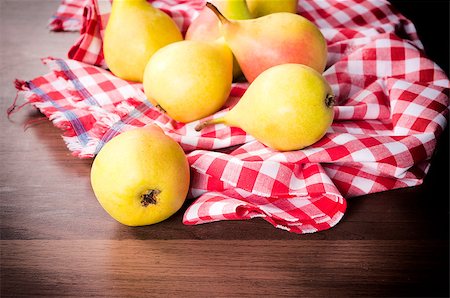 simsearch:6113-07565172,k - Fresh and organic pears on the table. Selective focus on the front pear Stock Photo - Budget Royalty-Free & Subscription, Code: 400-07044978