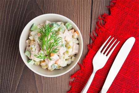 simsearch:640-02952163,k - Russian traditional salad on a wooden table Stock Photo - Budget Royalty-Free & Subscription, Code: 400-07046348