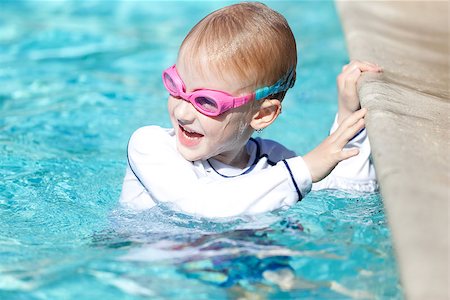 excited laughing boy at the swimming pool Stock Photo - Budget Royalty-Free & Subscription, Code: 400-07047143