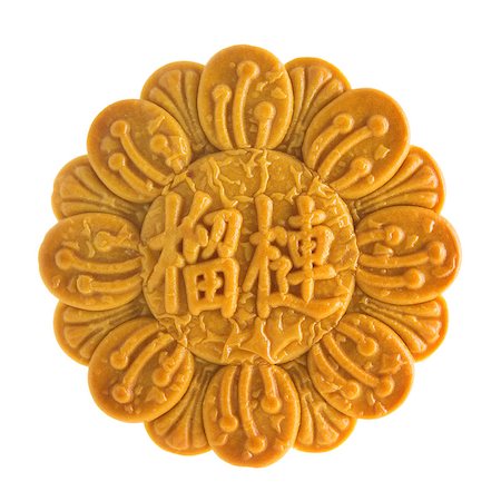 Traditional mooncake isolated on white background. Chinese mid autumn festival foods. The Chinese words on the mooncake means durian pure lotus paste, not a logo or trademark. Stock Photo - Budget Royalty-Free & Subscription, Code: 400-07047171