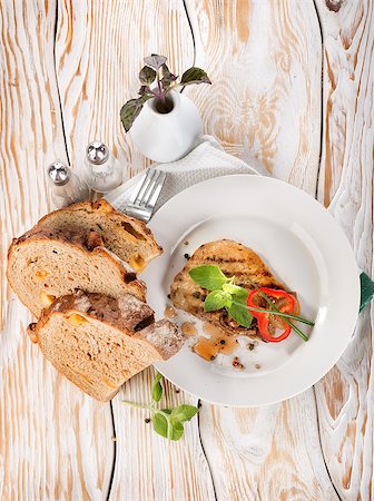 restaurant steak - Pork steak with bread on a wooden background Stock Photo - Budget Royalty-Free & Subscription, Code: 400-07047837