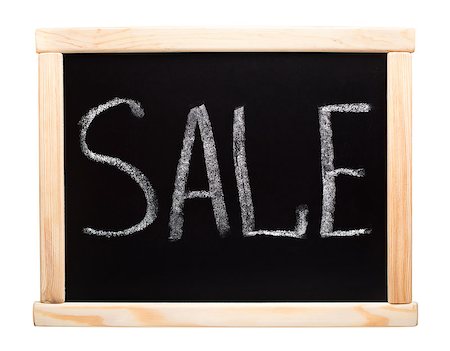 reduced sign in a shop - Word sale writtent with white chalk on blackboard Stock Photo - Budget Royalty-Free & Subscription, Code: 400-07048760