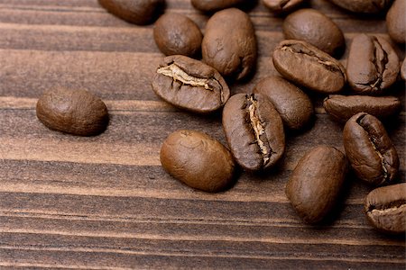simsearch:649-07118462,k - Coffee beans on the wooden background Stockbilder - Microstock & Abonnement, Bildnummer: 400-07048845