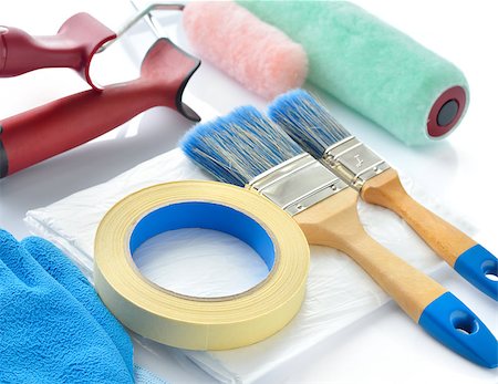 Painting tools on white background. Paint rollers, brushes, drop cloth, masking tape and gloves. Stockbilder - Microstock & Abonnement, Bildnummer: 400-07049971