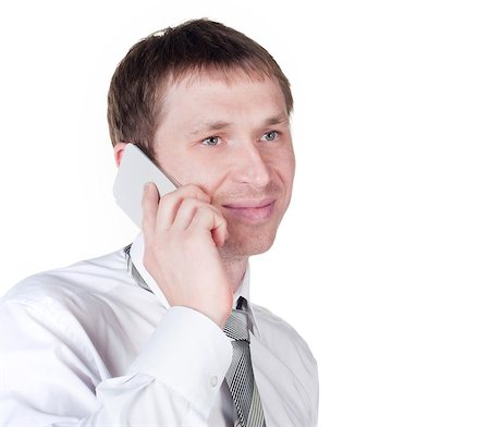 simsearch:400-04639378,k - happy successful young business man talking on mobile phone on white background Stock Photo - Budget Royalty-Free & Subscription, Code: 400-07040585