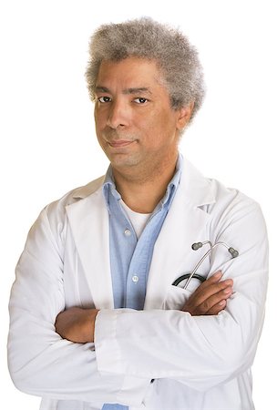 simsearch:400-07042113,k - Annoyed mature doctor with arms folded on isolated background Stock Photo - Budget Royalty-Free & Subscription, Code: 400-07042089