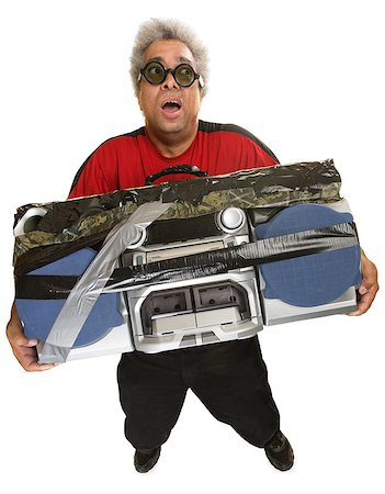 simsearch:400-07042108,k - Exhausted Hispanic man with heavy portable radio Stock Photo - Budget Royalty-Free & Subscription, Code: 400-07042118