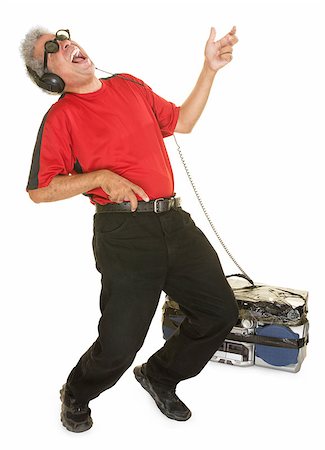 simsearch:400-07042108,k - Happy man with big tape deck playing air guitar Stock Photo - Budget Royalty-Free & Subscription, Code: 400-07042113