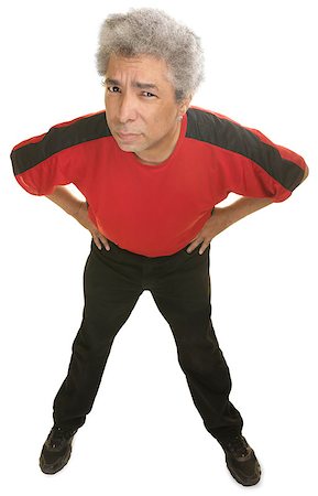 simsearch:400-07042108,k - Skeptical mature man with hands on hips leaning Stock Photo - Budget Royalty-Free & Subscription, Code: 400-07042126