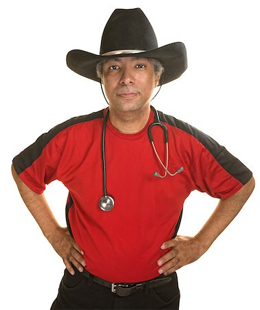 simsearch:400-07042108,k - Serious mature doctor in cowboy hat and stethescope Stock Photo - Budget Royalty-Free & Subscription, Code: 400-07042129
