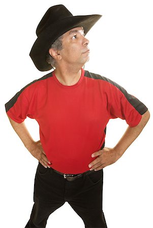 simsearch:400-07042108,k - Serious man in cowboy hat looking over Stock Photo - Budget Royalty-Free & Subscription, Code: 400-07042130