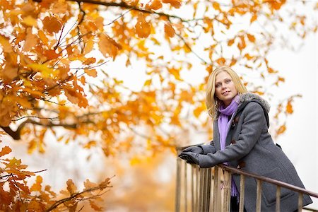 simsearch:400-07042487,k - beautiful smiling blond girl in autumn park Stock Photo - Budget Royalty-Free & Subscription, Code: 400-07042487