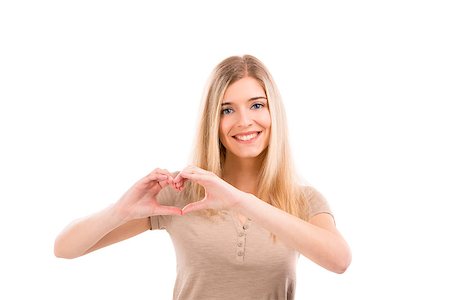 simsearch:400-06769983,k - Beautiful blonde woman smiling and doing a heart with her hands, isolated over white background Foto de stock - Royalty-Free Super Valor e Assinatura, Número: 400-07042578