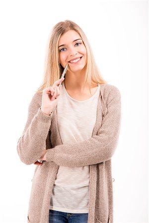 simsearch:400-05912369,k - Beautiful blonde woman smiling and holding a pen, isolated over white background Fotografie stock - Microstock e Abbonamento, Codice: 400-07042586