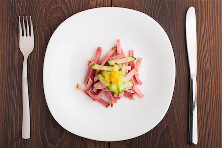 simsearch:400-07036577,k - Pieces of chopped ham on white plate Stock Photo - Budget Royalty-Free & Subscription, Code: 400-07042631