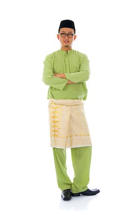 indonesian male during ramadan  aidilfitri  festival with isolated white background Stock Photo - Budget Royalty-Free & Subscription, Code: 400-07043418