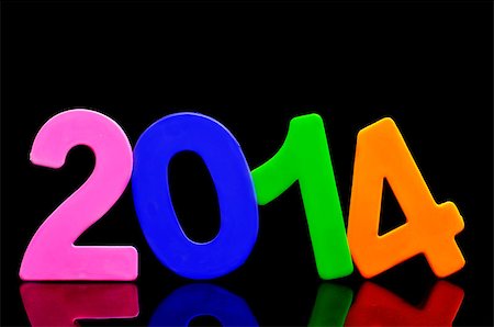 2014, as the new year, written with numbers of different colors on a black background Photographie de stock - Aubaine LD & Abonnement, Code: 400-07043502