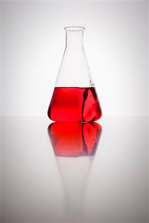A glass bottle with red liquid in a laboratory Stock Photo - Budget Royalty-Free & Subscription, Code: 400-07054396