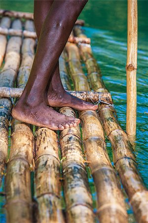 Feet of River Boat and Captain on Martha Brae River in Jamaica Stock Photo - Budget Royalty-Free & Subscription, Code: 400-07054608