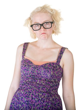 simsearch:400-06561343,k - Pouting female nerd in purple dress and glasses Stock Photo - Budget Royalty-Free & Subscription, Code: 400-07054618