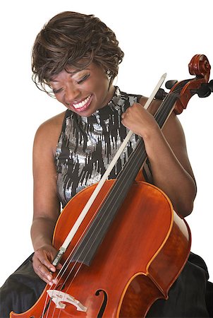 simsearch:400-07042113,k - Laughing Black female classical musician with cello Stock Photo - Budget Royalty-Free & Subscription, Code: 400-07054635