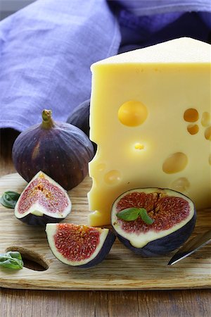 simsearch:825-02307375,k - piece of cheese (Maasdam) with fresh figs on a wooden board Photographie de stock - Aubaine LD & Abonnement, Code: 400-07055100
