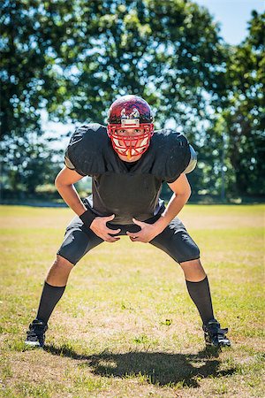 picture of concentrated american football player in position Stock Photo - Budget Royalty-Free & Subscription, Code: 400-07055371