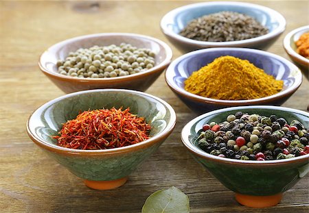 simsearch:400-06559340,k - different kinds of spices in ceramic bowls Stock Photo - Budget Royalty-Free & Subscription, Code: 400-07055690