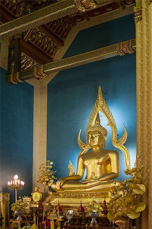 simsearch:400-06131825,k - This is a Buddha statue in the marble temple (Wat Benchamabophit Dusitvanaram) -  Bangkok, Thailand. Gold Buddha is situated against the blue background. Stock Photo - Budget Royalty-Free & Subscription, Code: 400-07055989