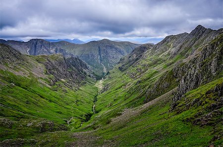 View of beautiful mountains in Glen Coe valley, Scotland, Great Britain Fotografie stock - Microstock e Abbonamento, Codice: 400-07056387