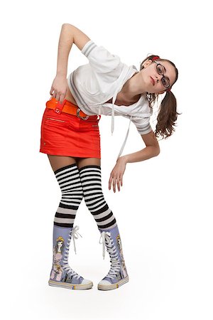 girl in striped socks, mini skirt and Pigtails on a white background Stock Photo - Budget Royalty-Free & Subscription, Code: 400-07056452