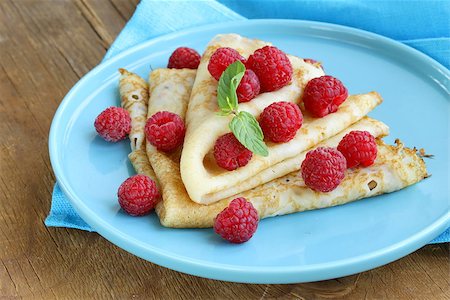 pancakes (crepes) with raspberries and mint -  healthy breakfast Stock Photo - Budget Royalty-Free & Subscription, Code: 400-07056795